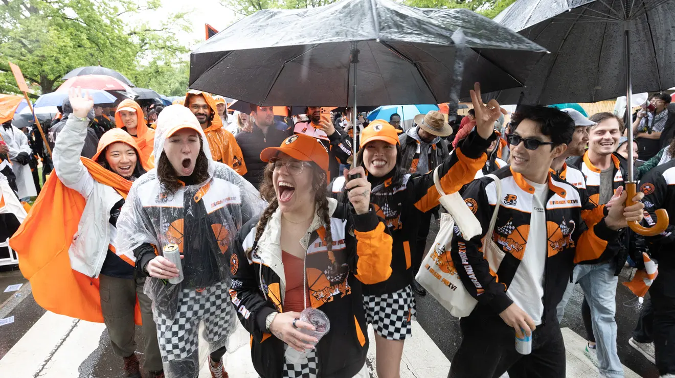 PRADE_Crossong the finish Line_Kevin Birch.jpg People cheer as they march in the P-rade.
