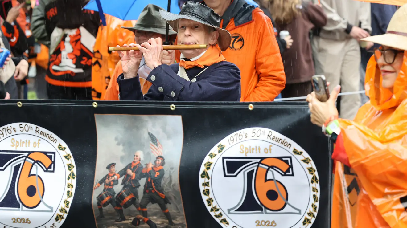 PRADE_Spirit of 76_Kevin Birch.jpg A man plays a fife behind a 1776 banner.