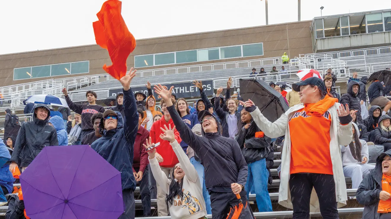 OTC_Football Opener.jpg A nor’easter brought wind gusts and light rain to Princeton Stadium during the football team’s home opener against the University at Albany Sept. 26, but the weather did not muffle the hearty fans — or slow down the Tigers. Running back Kai Honda ’28 scored two touchdowns to lead Princeton to a 22-0 win, the program’s first shutout in nearly five years.